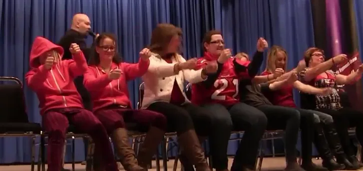 Volunteers on stage during a comedy hypnosis show